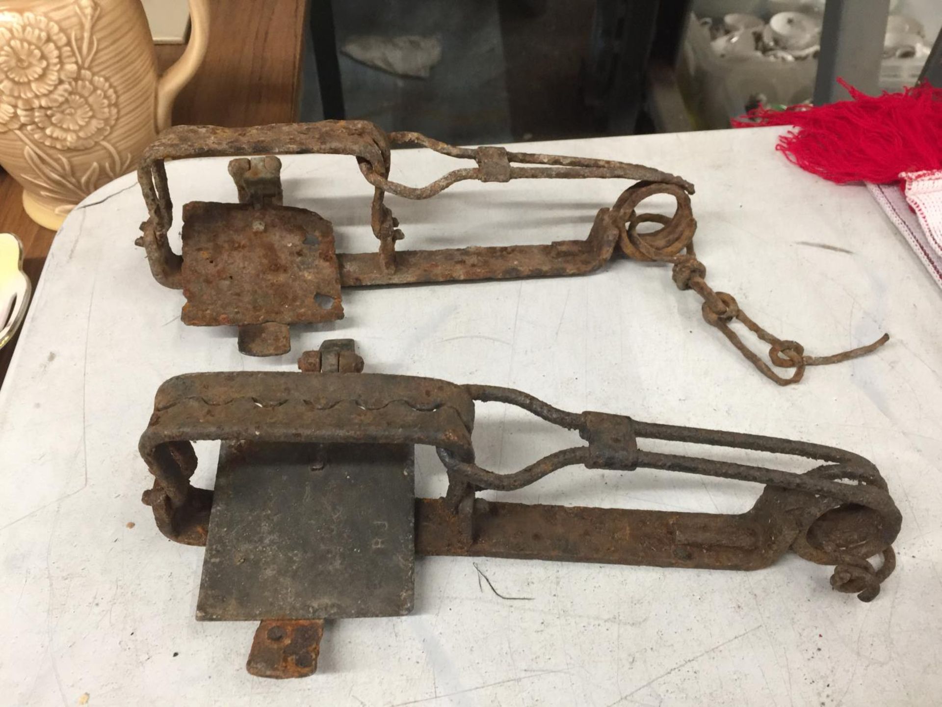 TWO VINTAGE METAL BEAR TRAPS