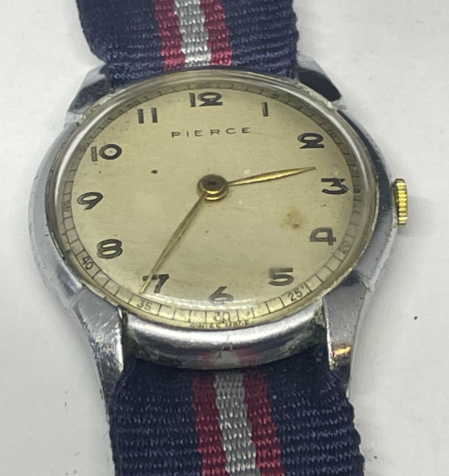 A PIERCE GENTS MILITARY STYLE WATCH, SEEN WORKING BUT NO WARRANTIES GIVEN