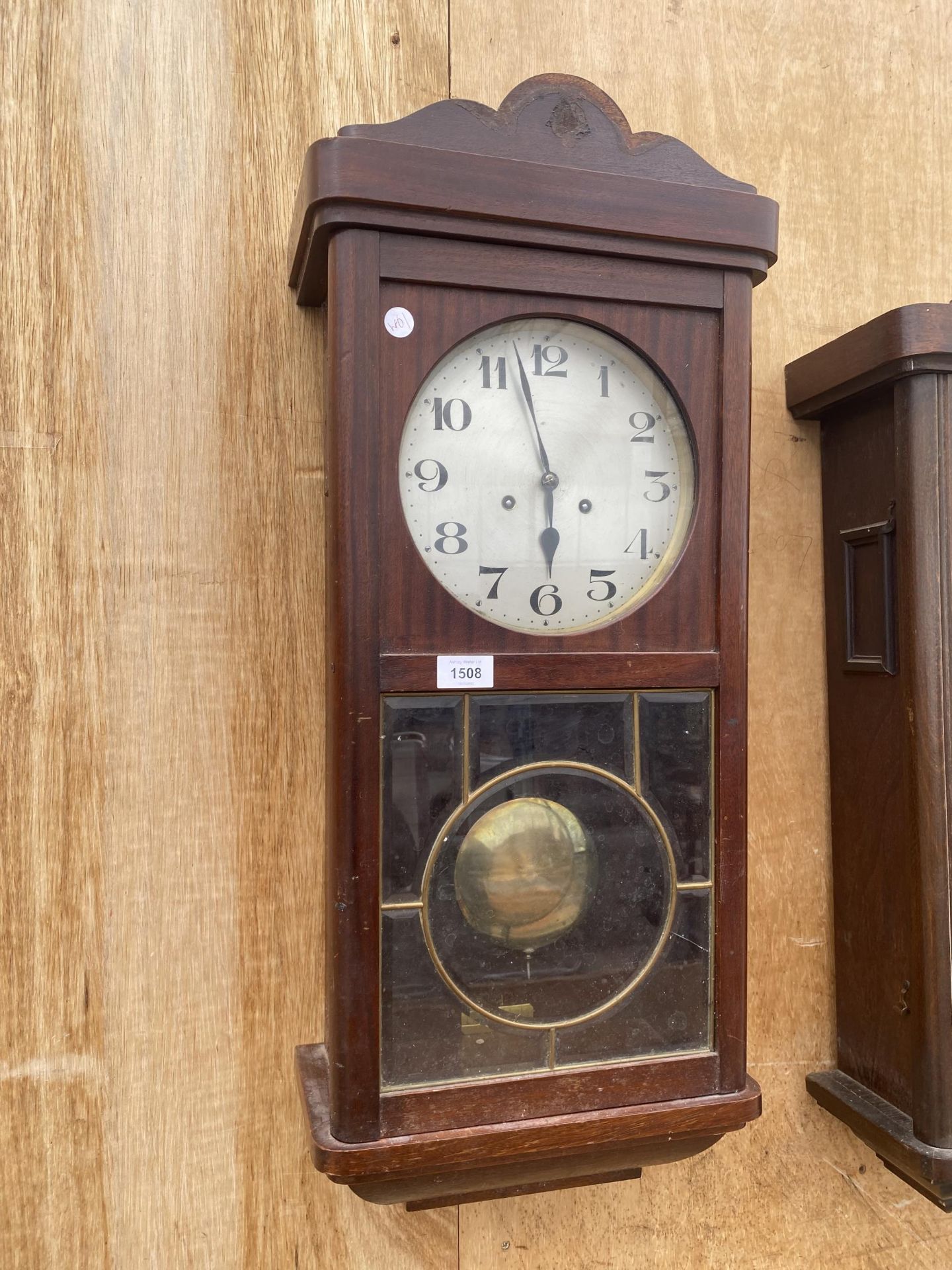 A WOODEN VIENNA STYLE WALL CLOCK