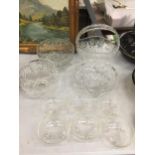 A QUANTITY OF CUT GLASSWARE TO INCLUDE BOWLS, A BASKET BOWL, DESSERT DISHES, ETC