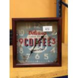 A TIN FRAMED COFFEE DESIGN CLOCK