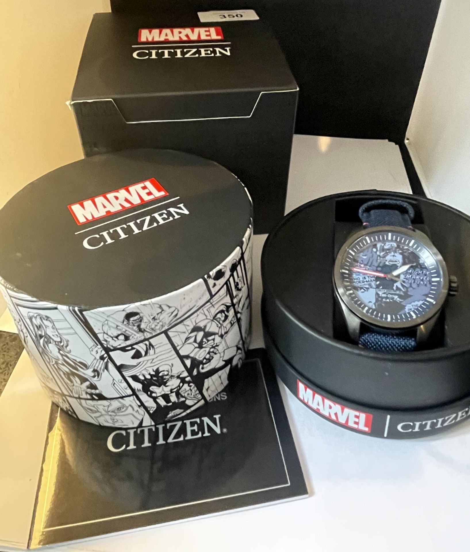 A GENTS CITIZEN ECO DRIVE MARVEL COMICS WRIST WATCH WITH ORIGINAL BOX SEEN WORKING BUT NO WARRANTY