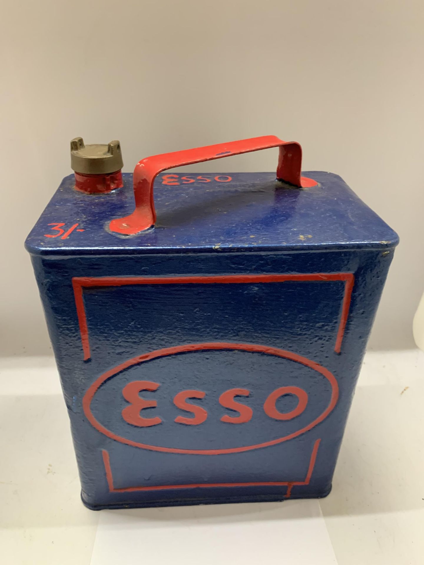 A VINTAGE ESSO PETROL CAN WITH BRASS TOP