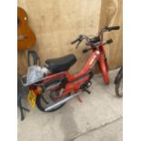 A VINTAGE RED TOMAS 49CC MOPED COMPLETE WITH V5 CERTIFICATE, REGISTRATION E660URJ, FIRST