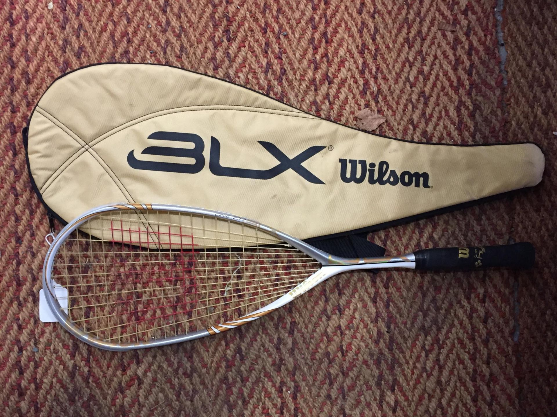 A WILSON HYBRID SPORTS RACKET WITH CASE
