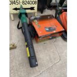 A BLACK AND DECKER ELECTRIC LAWN RAKE AND AN ELECTRIC QUALCAST LEAF VAC