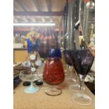 A QUANTITY OF COLOURED GLASSWARE TO INCLUDE A MURANO STYLE CLOWN, LARGE BRANDY BALLOON, WINE