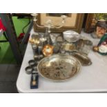 A LARGE QUANTITY OF SILVER PLATED ITEMS TO INCLUDE A CANDLEABRA, CRUETS, TRAYS, A HAND MIRROR,