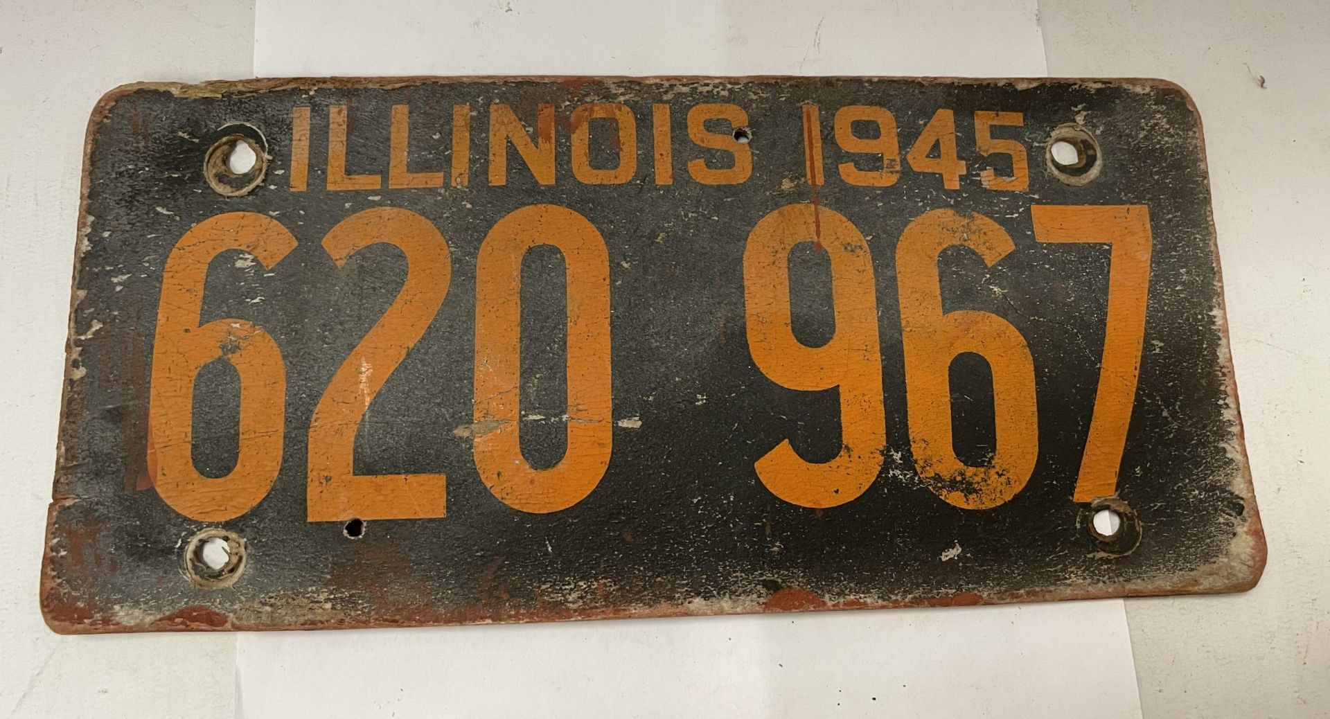 A VINTAGE LEATHER ILLONOIS NUMBER PLATE 620 967