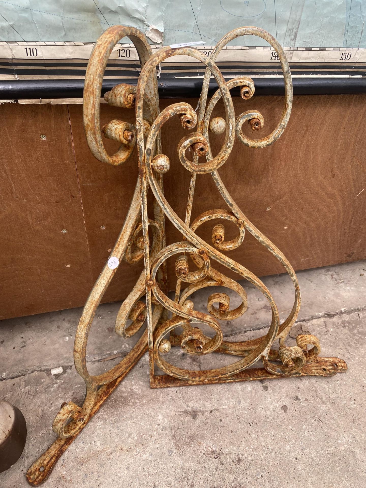 THREE VICTORIAN CAST IRON BRACKETS