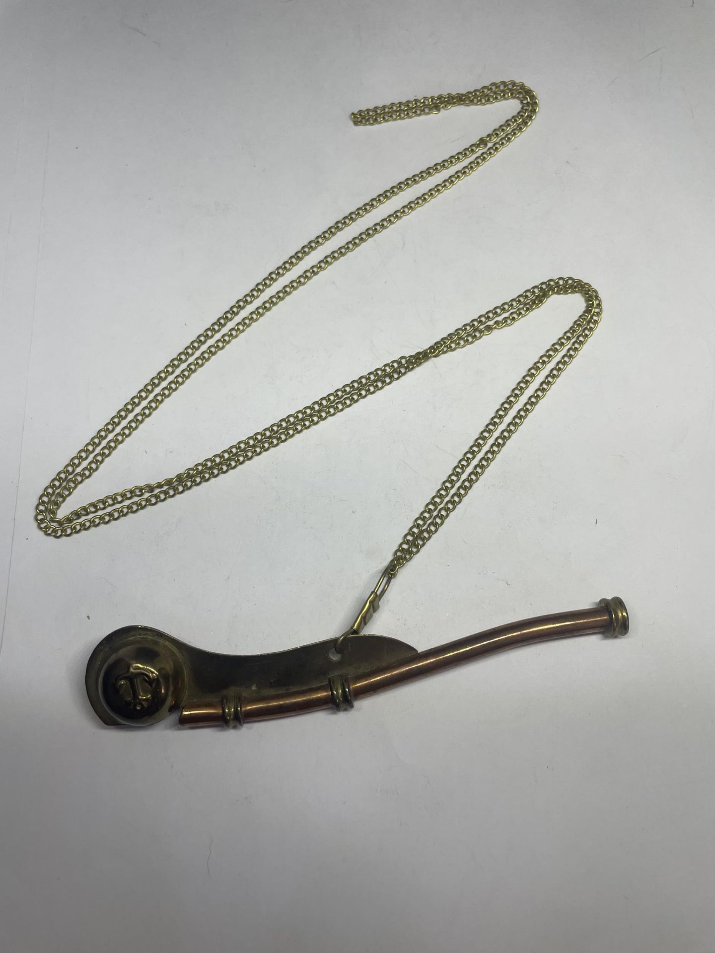 A BOSSONS WHISTLE AND CHAIN