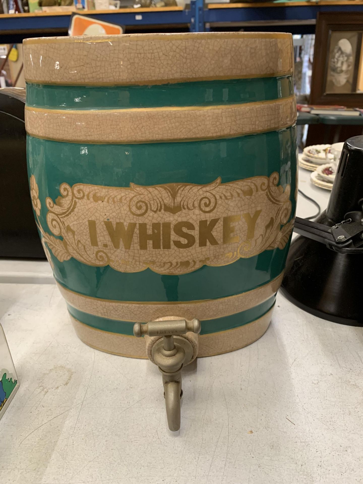 A VINTAGE CERAMIC WHISKEY BARREL DECANTER