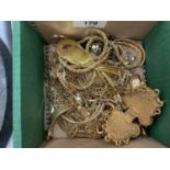 A QUANTITY OF YELLOW METAL COSTUME JEWELLERY TO INCLUDE CHAINS, ETC