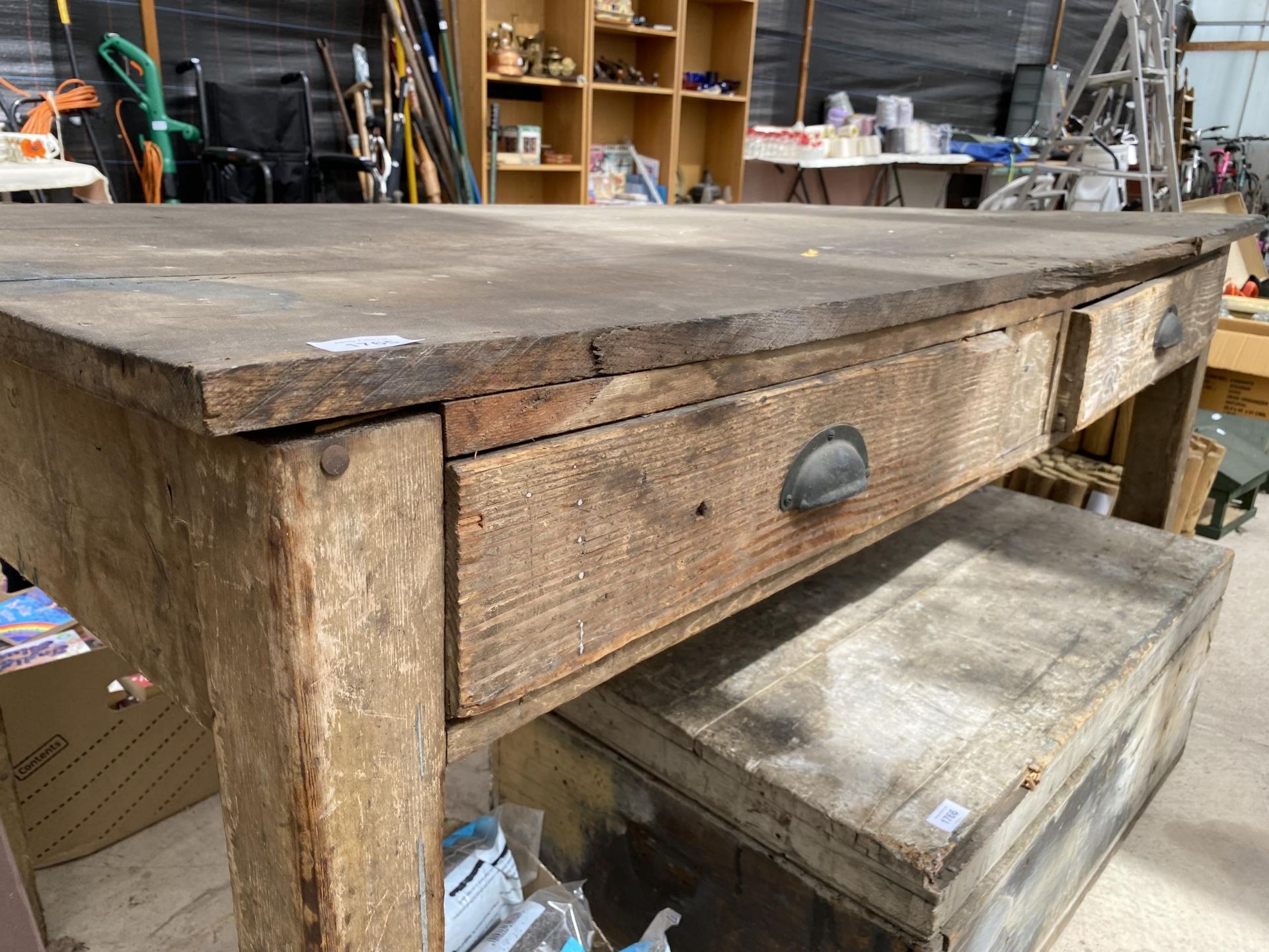 A VINTAGE WOODEN WORK BENCH WITH TWO DRAWERS - Image 2 of 2