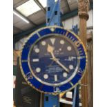 A DEALERS WALL CLOCK