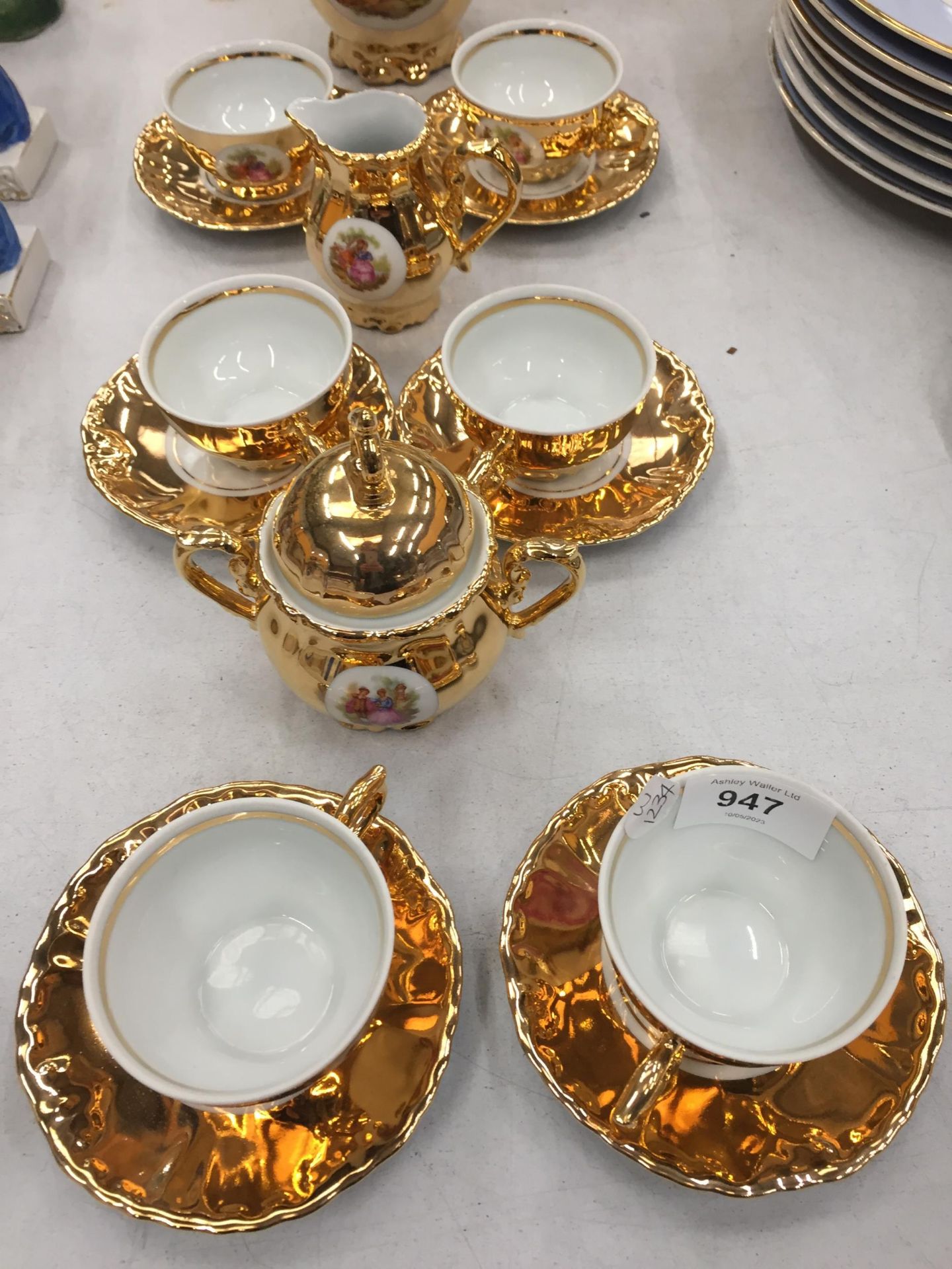 A CONTINENTAL GILT DESIGN TEA SET - Image 3 of 5