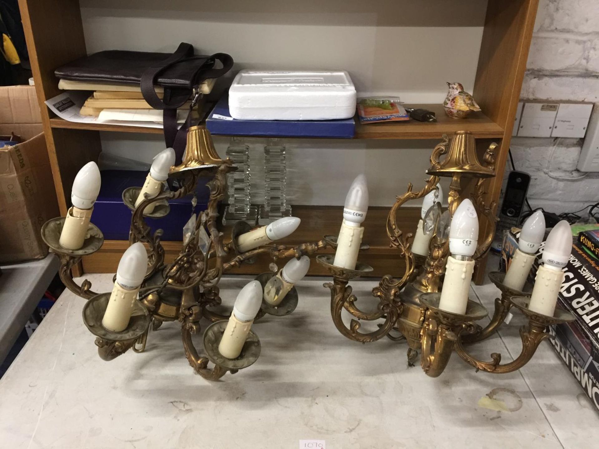 A PAIR OF VINTAGE BRASS CHANDELIERS
