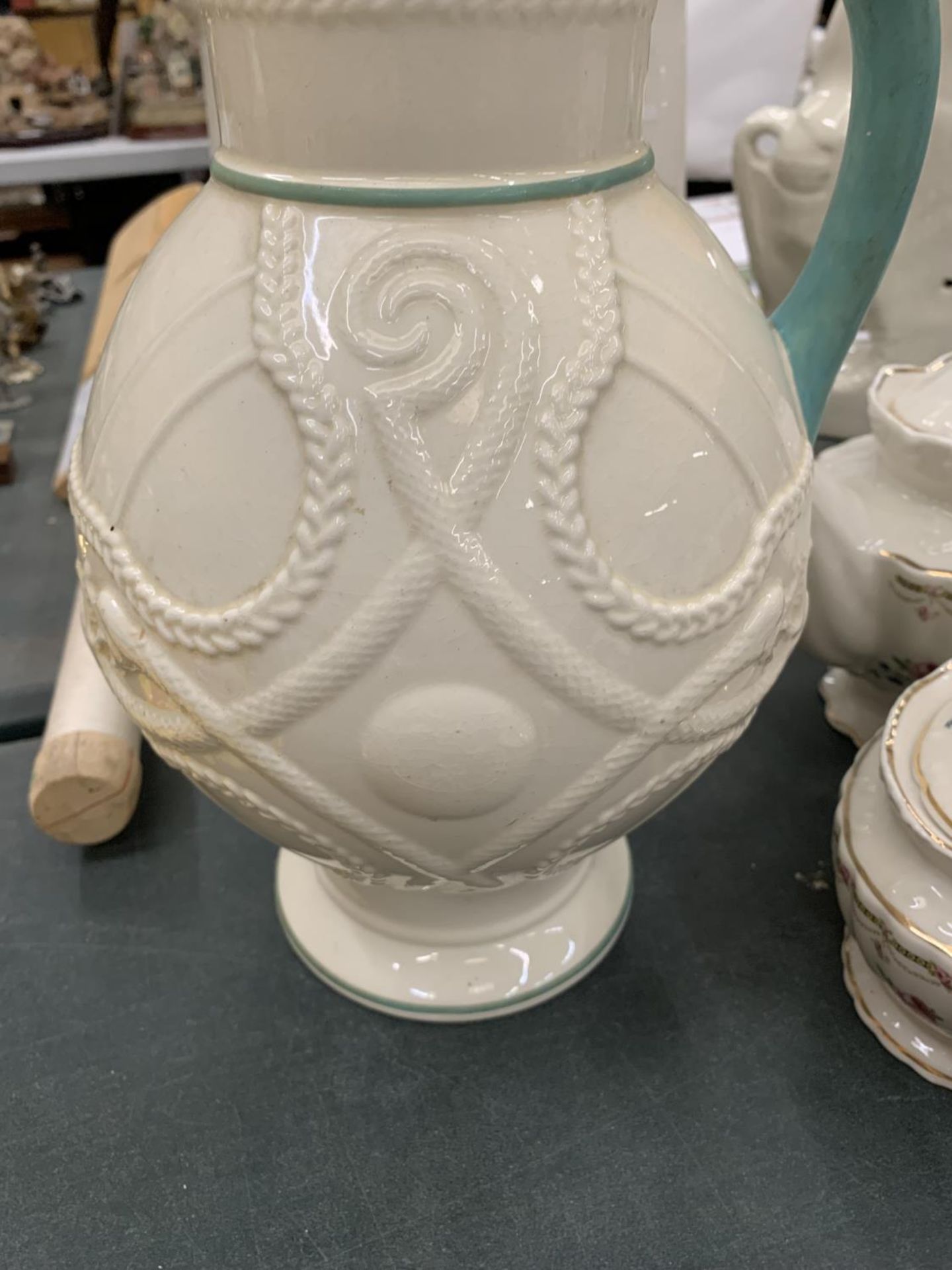 A CREAMWARE STYLE JUG WITH EMBOSSED SERPENTS AND GREEN HANDLE, HEIGHT 34CM - A/F - Image 2 of 5