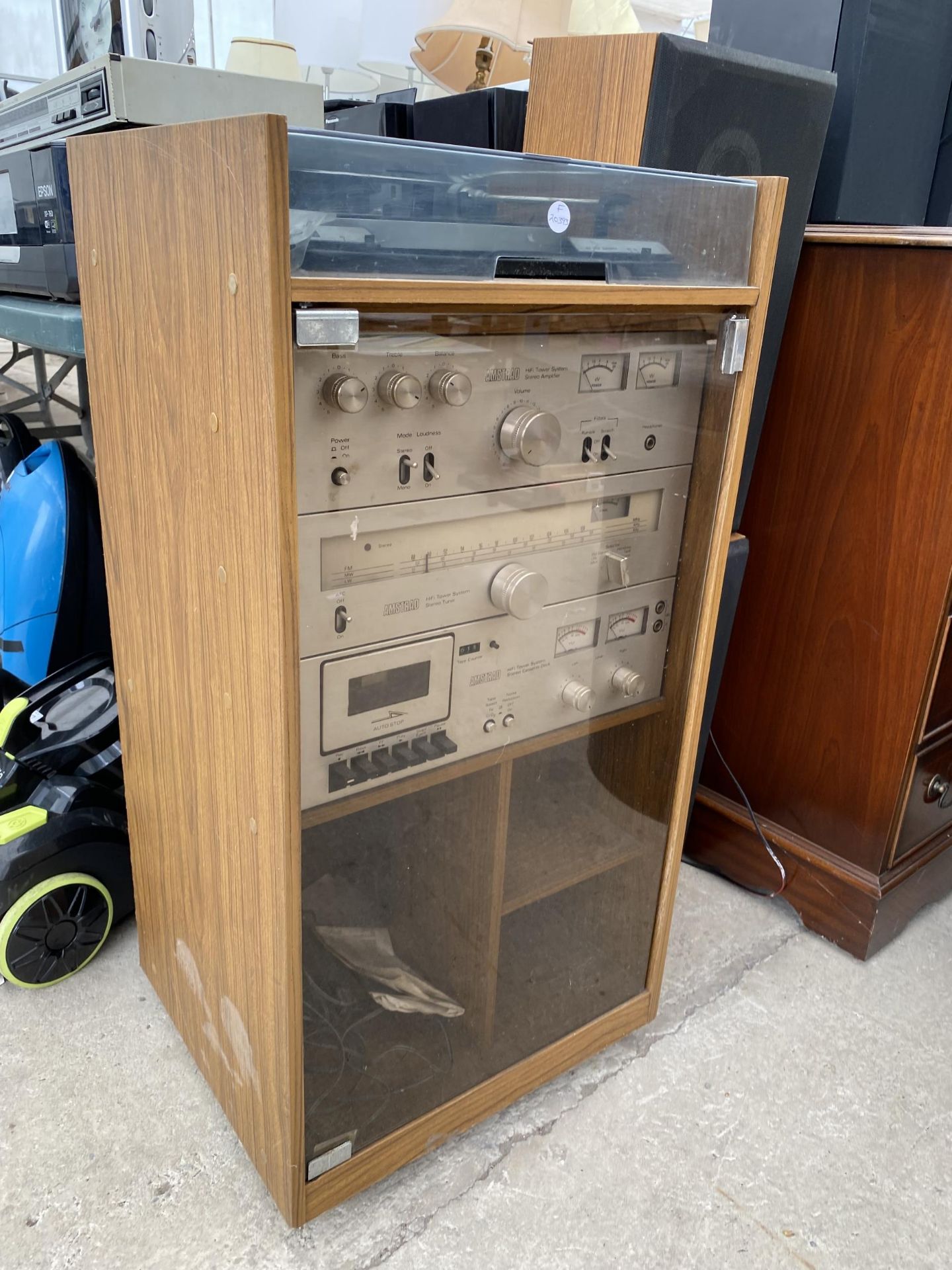 A TEAK RECORD CABINET WITH AN ASSORTMENT OF AMSTRAD STEREO EQUIPMENT AND TWO SPEAKERS - Image 2 of 4