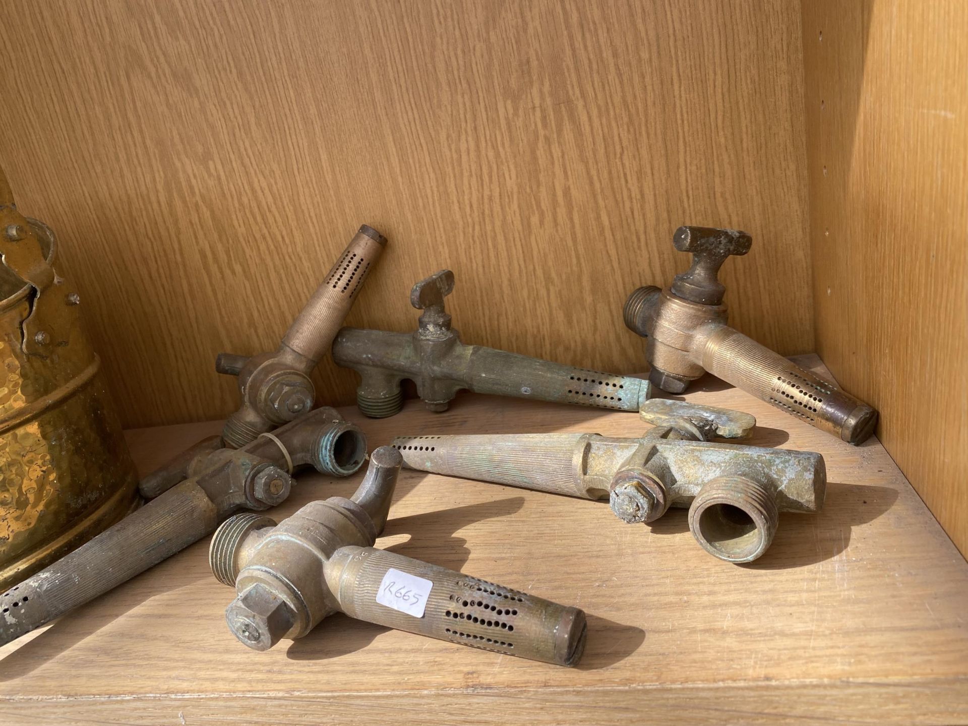 A SMALL BRASS COAL BUCKET AND SIX VINTAGE BRASS BEER BARREL TAPS - Image 2 of 2