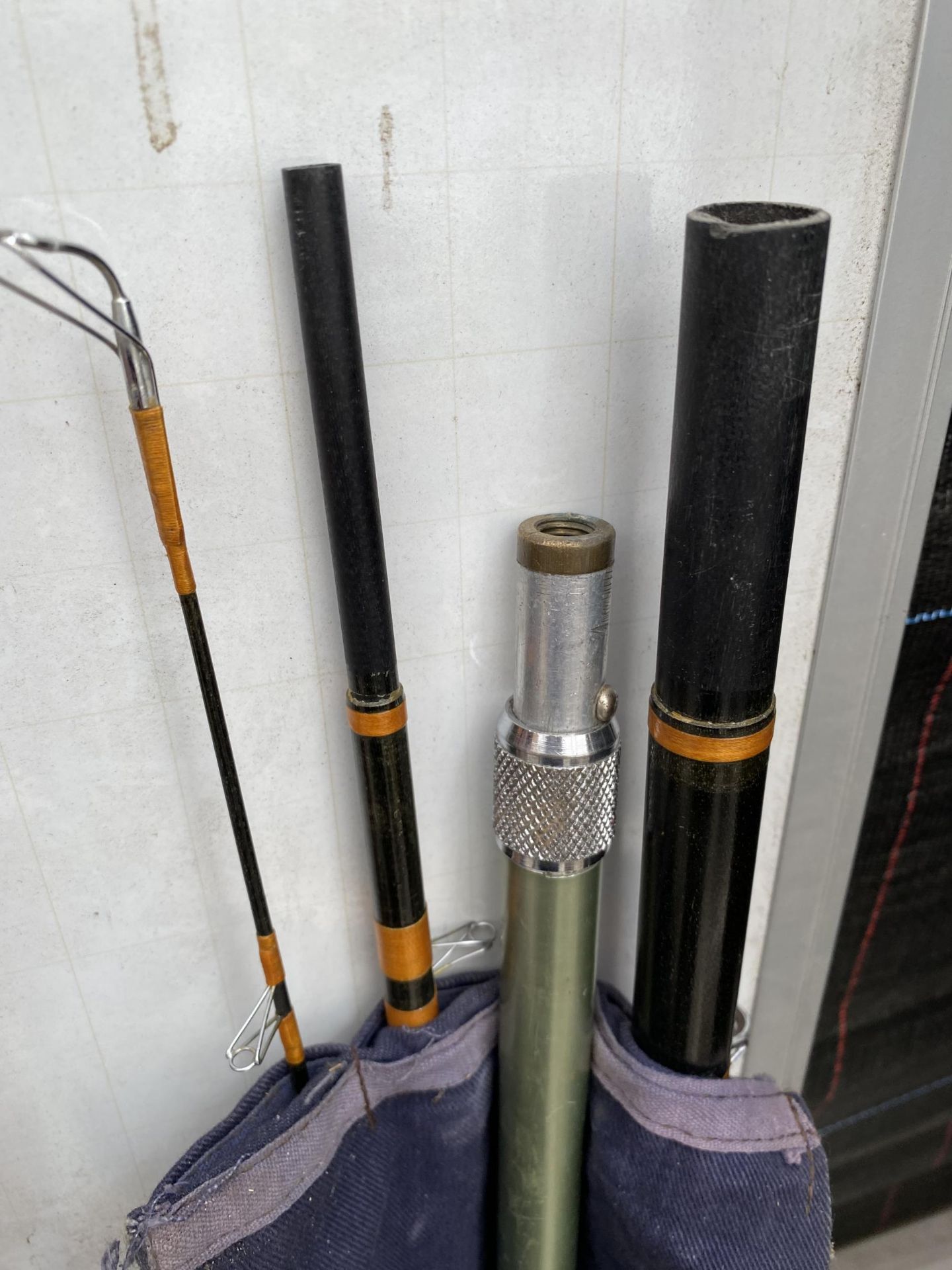 A MITCHELL TYMALLUS CARBON FISHING ROD, A FURTHER GLASS FISHING ROD AND A NET POLE - Image 2 of 4