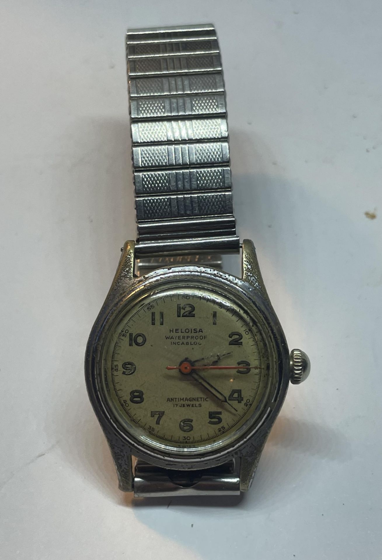 A HELOISA MILITARY STYLE WATCH SEEN WORKING BUT NO WARRANTIES