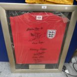 A FRAMED AUTHENTIC 1966 ENGLAND WORLD CUP FOOTBALL SHIRT SIGNED BY GORDON BANKS, GEOFF HURST, JACK