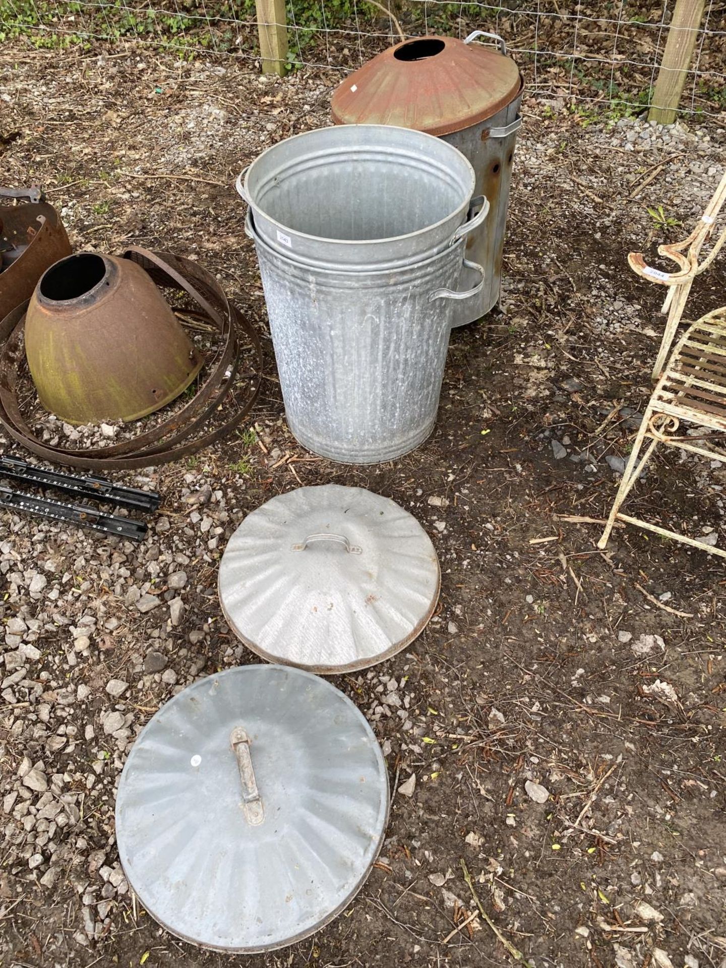 TWO GALVANISED BINS AND A GARDEN BURNER