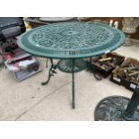 A LARGE CAST ALLOY PATIO TABLE