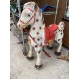 A VINTAGE TIN RIDE ALONG CHILDS HORSE