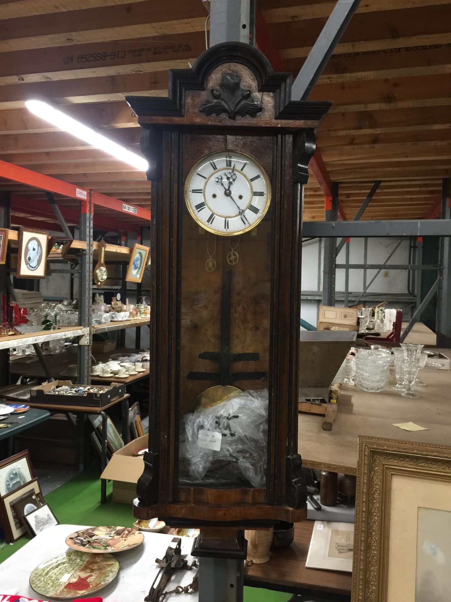 A VICTORIAN DOUBLE WEIGHT VIENNA CASED WALL CLOCK WITH CARVED LEAF AND ACORN DECORATION COMPLETE