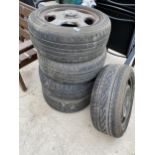 A SET OF FOUR MERCEDES-BENZ RIMS WITH 215/55ZR16 TYRES AND A FURTHER SPARE WHEEL