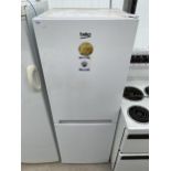 A WHITE BEKO UPRIGHT FRIDGE FREEZER