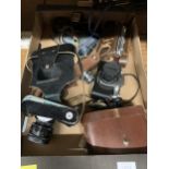 A QAUNTITY OF VINTAGE CAMERAS TO INCLUDE ZENIT-E, HALINA 35X, KOWA SE, VINTAGE BINOCULARS, ETC