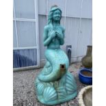 A LARGE FIBRE GLASS MERMAID GARDEN FEATURE (H:215CM) (PLEASE NOTE THIS WAS A FORMER 1999 BLACKPOOL