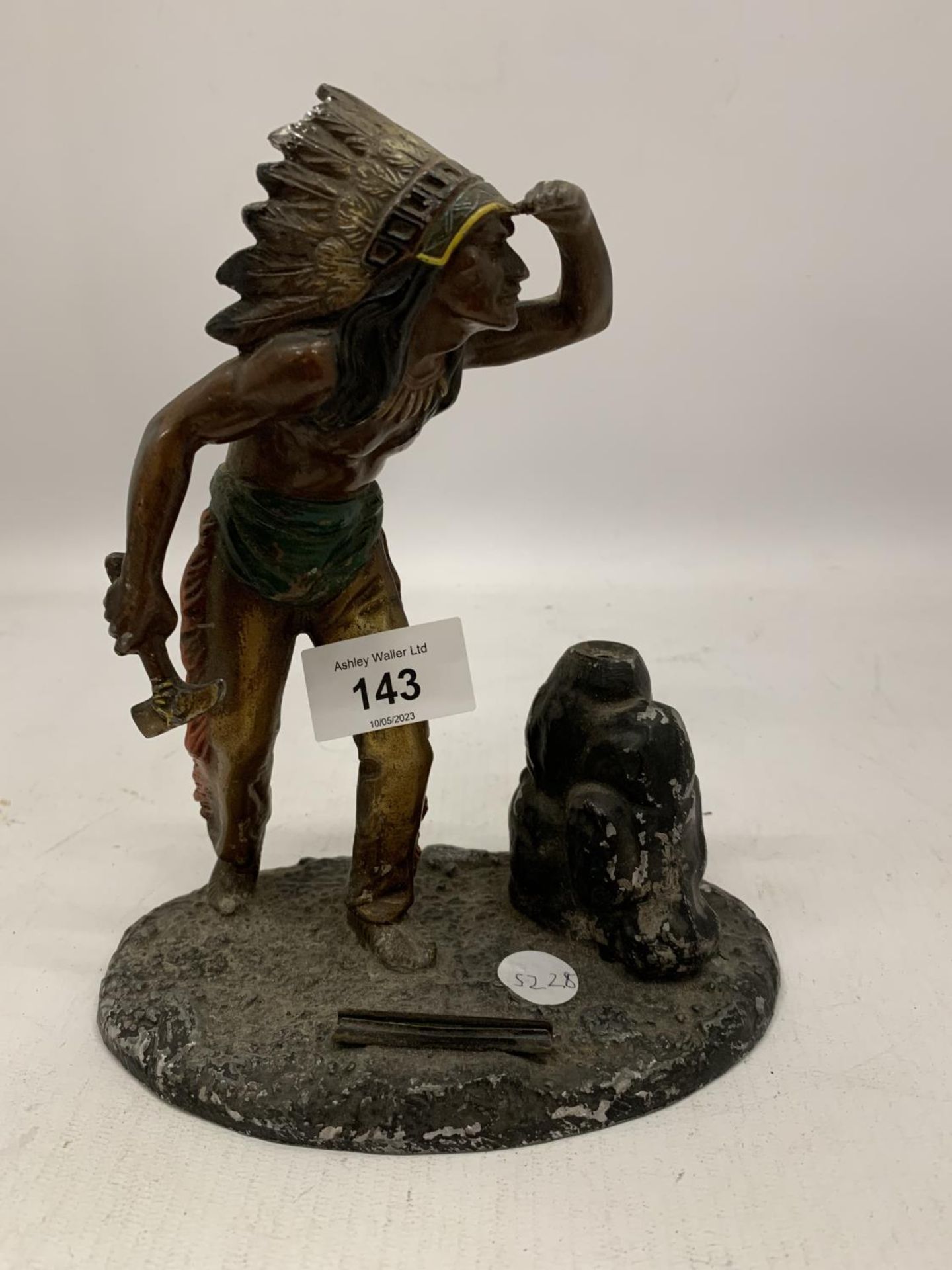 A VINTAGE SPELTER LIGHTER IN THE FORM OF A NATIVE INDIAN HEIGHT 20CM - A/F