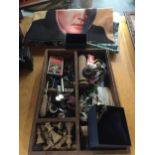 A WOODEN BOX CONTAINING A MIXED LOT TO INCLUDE VINTAGE BUTTONS, CHESS PIECES, TOOLS, WATCHES,