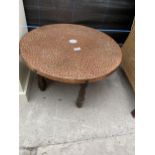 A 23.5" DIAMETER PUB TABLE WITH COPPER TOP