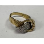 AN 18 CARAT GOLD TWIST RING WITH A BAND OF DIAMONDS SIZE O IN A PRESENTATION BOX GROSS WEIGHT 7.51