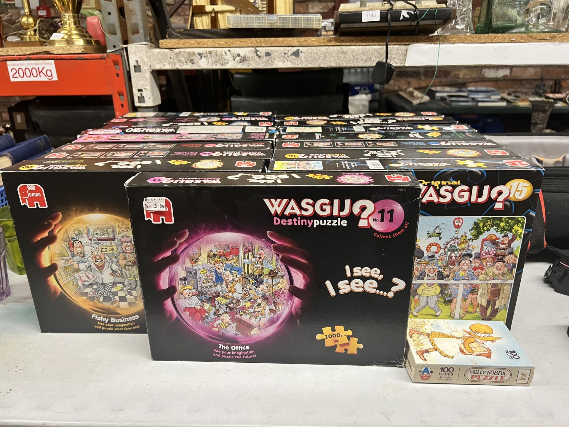 A LARGE QUANTITY OF WASGIJ JIGSAW PUZZLES - UNCHECKED