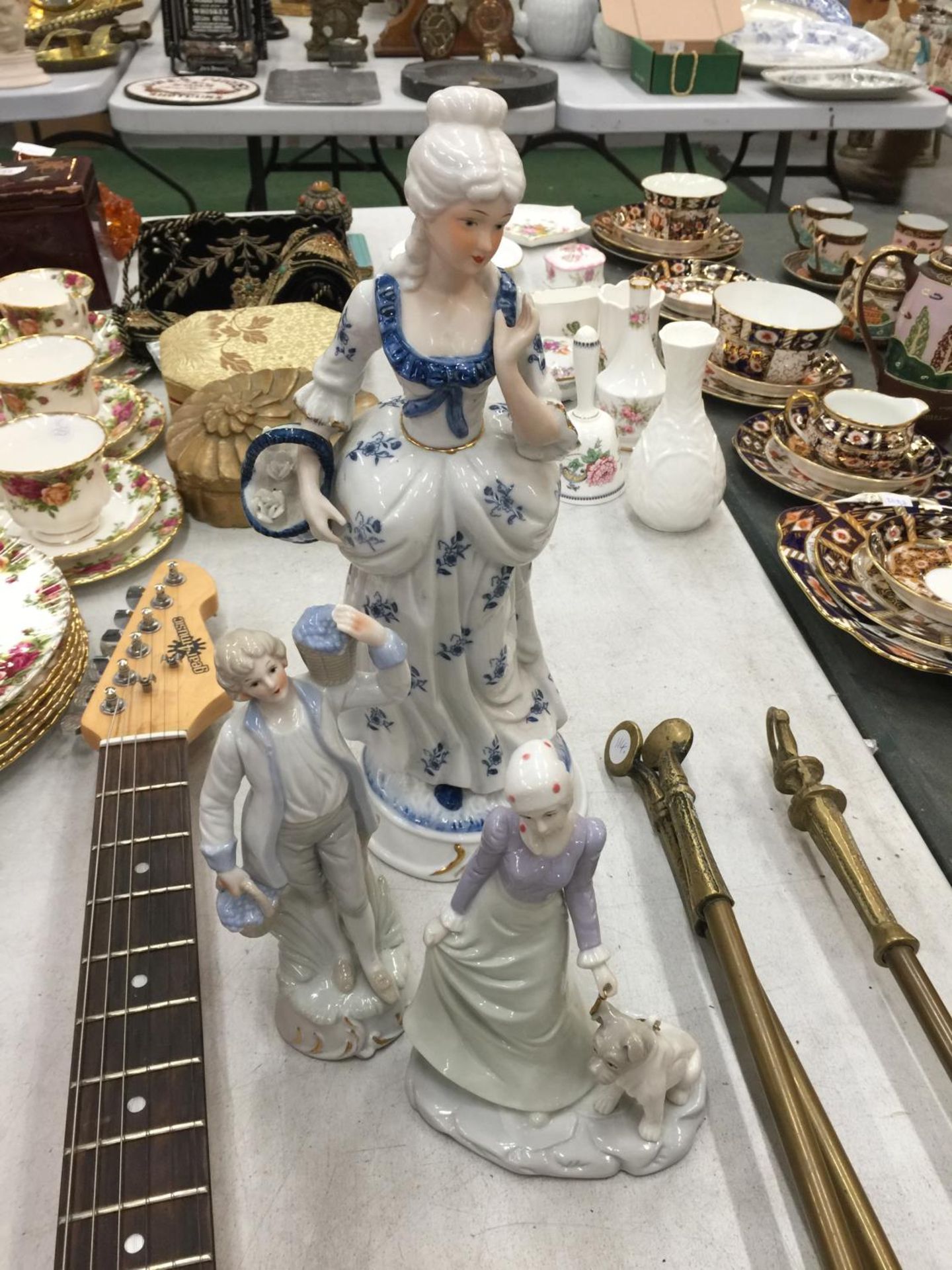 A COLLECTION OF THREE CONTINENTAL FIGURINES