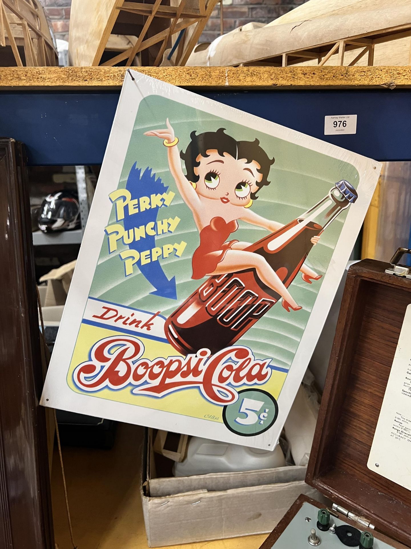 A TIN PLATE BETTY BOOP SIGN (BOOPSI COLA)