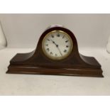 A MAHOGANY CASED WIND UP MANTLE CLOCK