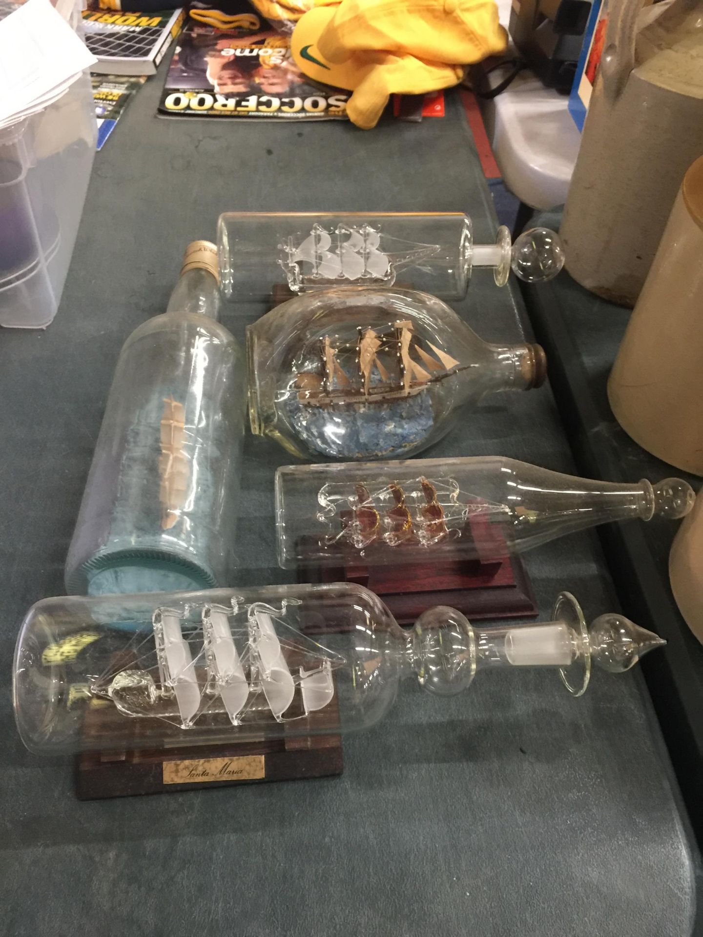 FIVE SHIPS IN BOTTLES