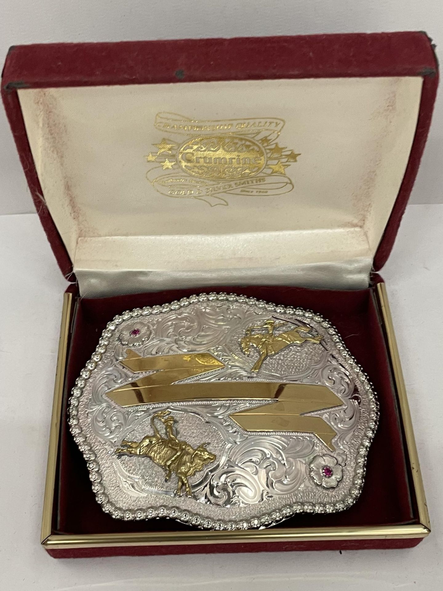 A BOXED STERLING SILVER PLATE AMERICAN BELT BUCKLE, STAMPED WITH MONTANA SILVER SMITHS MAKERS MARK