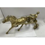 A VINTAGE BRASS MODEL OF A HORSE AND RIDER, LENGTH 37CM
