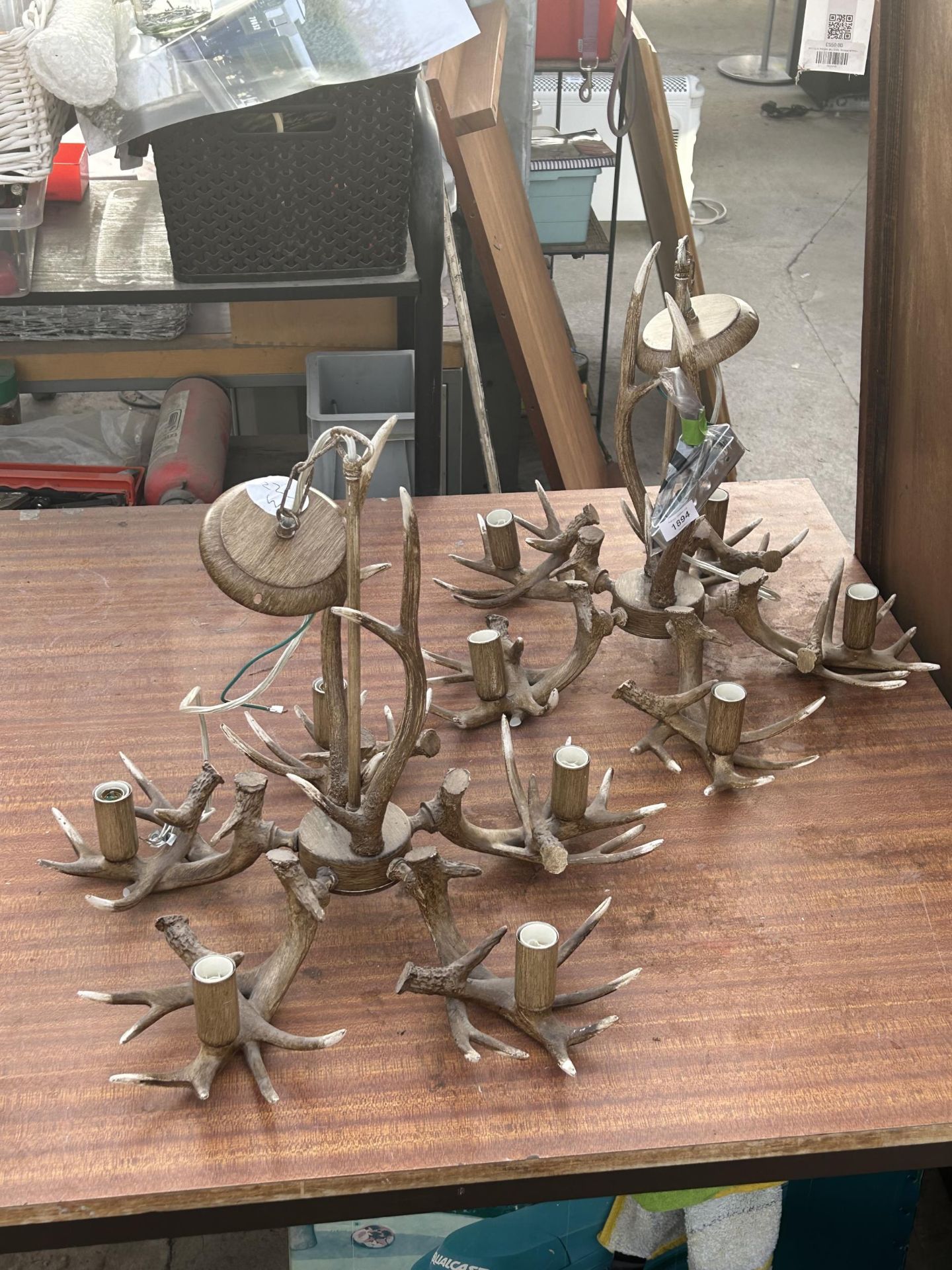 A PAIR OF ANTLER STYLE LIGHT FITTINGS