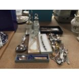 A MIXED LOT TO INCLUDE A SILVER PLATED CRUET STAND WITH GLASS BOTTLES, SOUVENIR TEASPOONS, FLATWARE,