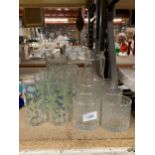 A VINTAGE STYLE LEMONADE SET TO INCLUDE A JUG AND SIX TUMBLERS, TWO OTHER JUGS AND GLASSES