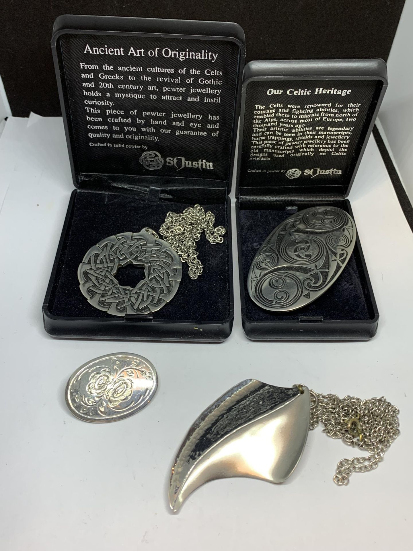 THREE PEWTER ITEMS TO INCLUDE A ST JUSTIN CELTIC STYLE PENDANT AND BROOCH BOTH BOXED, A FURTHER